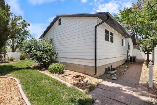 9499 S 220 E, Sandy, UT 84070 - view of property exterior featuring a fenced backyard and a central air condition unit
