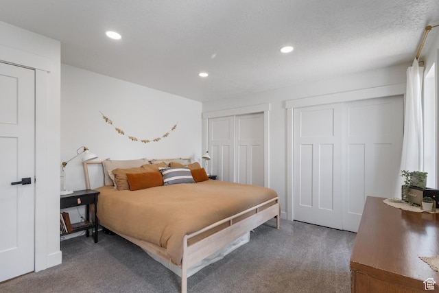 9499 S 220 E, Sandy, UT 84070 - carpeted bedroom featuring recessed lighting and two closets