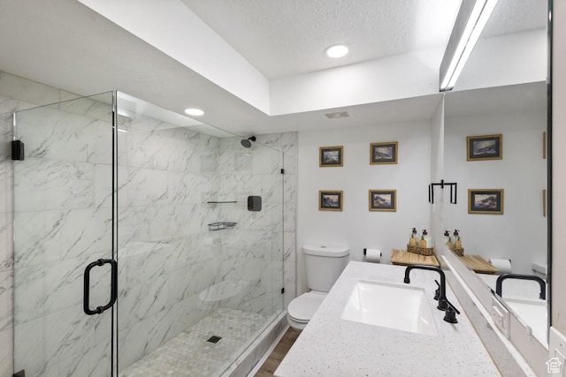 9499 S 220 E, Sandy, UT 84070 - full bathroom with vanity, a marble finish shower, recessed lighting, a textured ceiling, and wood finished floors