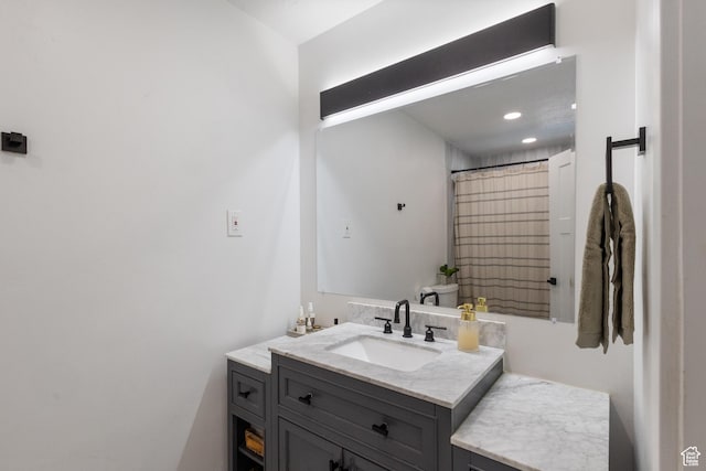 9499 S 220 E, Sandy, UT 84070 - bathroom featuring vanity, a shower with shower curtain, and recessed lighting