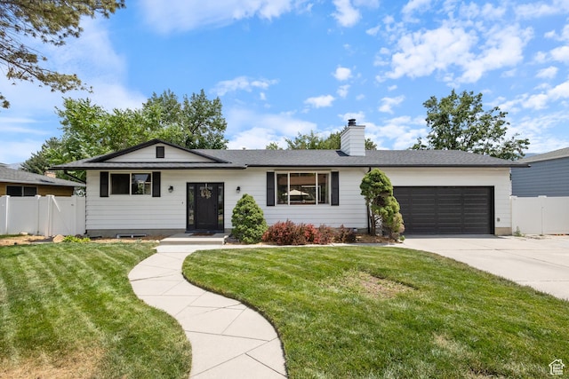9499 S 220 E, Sandy, UT 84070 - ranch-style house featuring a garage, driveway, and a chimney