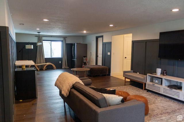 4373 N Foxtrail Dr, Lehi, UT 84043 - living room with a textured ceiling, recessed lighting, and wood finished floors