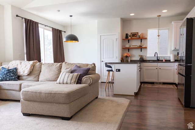 4373 N Foxtrail Dr, Lehi, UT 84043 - living area with dark wood finished floors and recessed lighting
