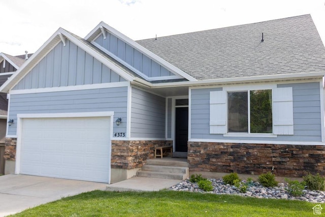 4373 N Foxtrail Dr, Lehi, UT 84043 - craftsman-style house featuring stone siding, board and batten siding, an attached garage, and a shingled roof