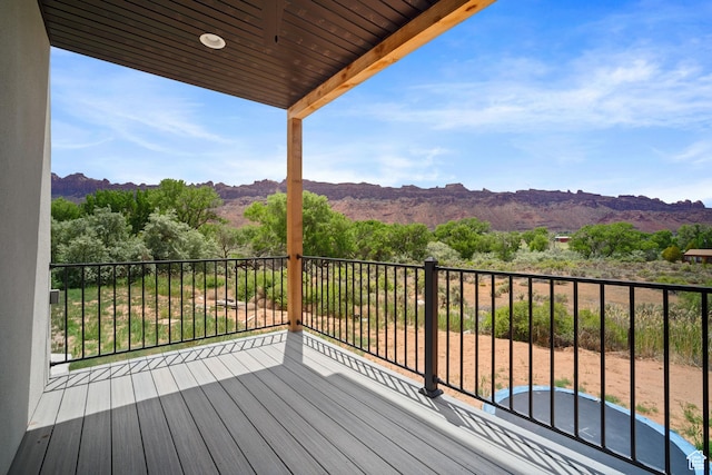 3317 S Watchman Trl, Moab, UT 84532 - wooden deck with a mountain view