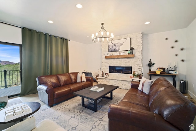 3317 S Watchman Trl, Moab, UT 84532 - living room featuring wood finished floors, a chandelier, a stone fireplace, and recessed lighting