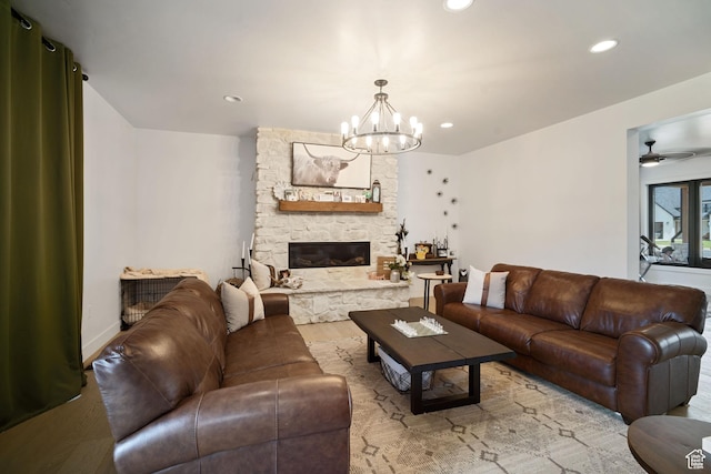 3317 S Watchman Trl, Moab, UT 84532 - living area with wood finished floors, a chandelier, recessed lighting, a fireplace, and a ceiling fan