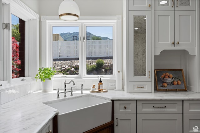 5040 S 1450 E, Ogden, UT 84403 - kitchen with a sink and light stone countertops