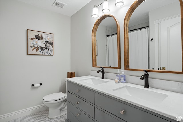 5040 S 1450 E, Ogden, UT 84403 - full bath with double vanity and tile patterned floors