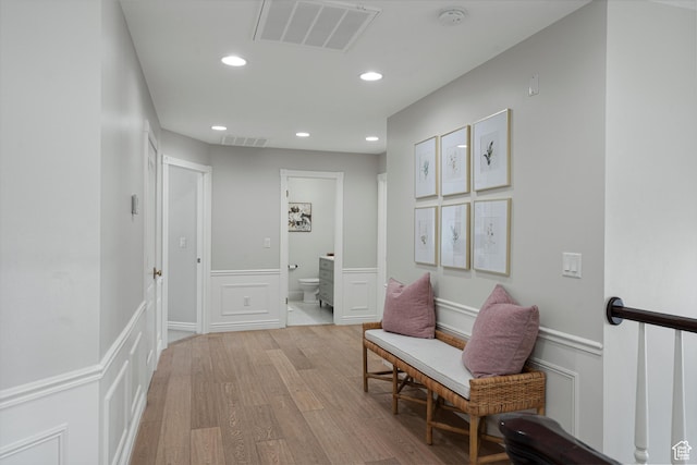5040 S 1450 E, Ogden, UT 84403 - hall with light wood-type flooring, a decorative wall, a wainscoted wall, and recessed lighting