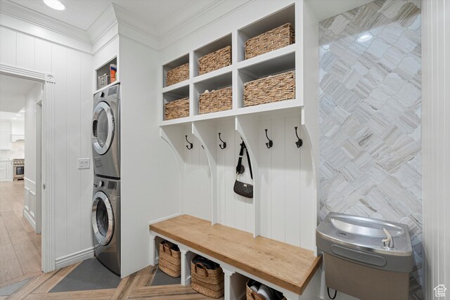 5040 S 1450 E, Ogden, UT 84403 - mudroom featuring stacked washer and clothes dryer and crown molding
