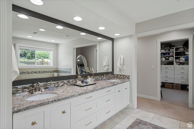 5040 S 1450 E, Ogden, UT 84403 - bathroom featuring double vanity, a spacious closet, and recessed lighting