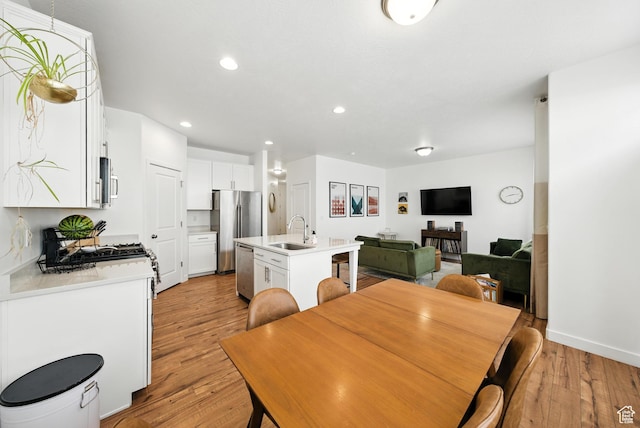 15104 S Halter Way, Bluffdale, UT 84065 - dining space featuring light wood finished floors and recessed lighting