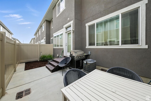 15104 S Halter Way, Bluffdale, UT 84065 - fenced backyard featuring a patio area, grilling area, and outdoor dining area