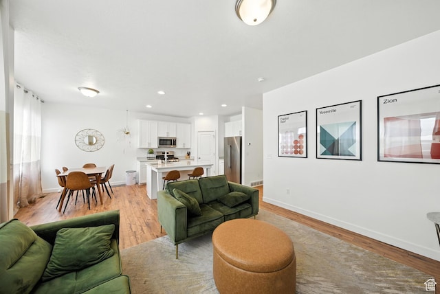 15104 S Halter Way, Bluffdale, UT 84065 - living area with light wood-type flooring and recessed lighting