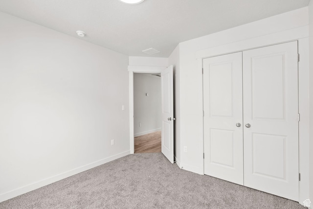 688 E 500 S Unit 108, Provo, UT 84606 - unfurnished bedroom with carpet flooring and a closet