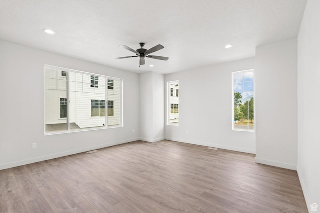 688 E 500 S Unit 108, Provo, UT 84606 - unfurnished room featuring wood finished floors, a ceiling fan, and recessed lighting