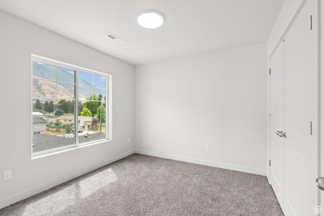 688 E 500 S Unit 108, Provo, UT 84606 - unfurnished bedroom featuring carpet and a closet