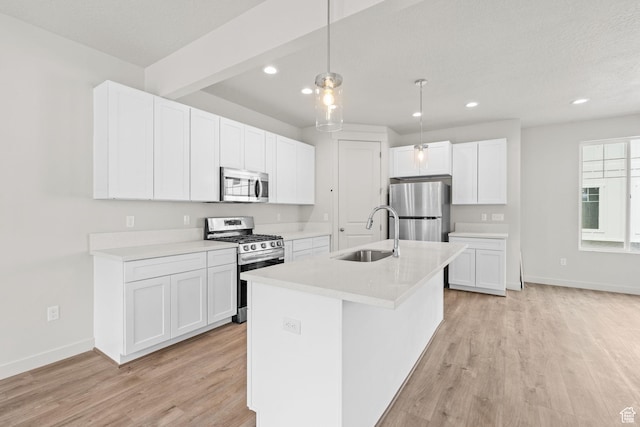 688 E 500 S Unit 108, Provo, UT 84606 - kitchen featuring stainless steel appliances, light wood-type flooring, recessed lighting, white cabinetry, and light countertops