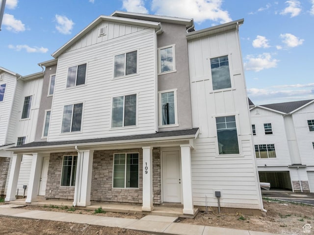 688 E 500 S Unit 108, Provo, UT 84606 - multi unit property featuring board and batten siding, a porch, and stone siding