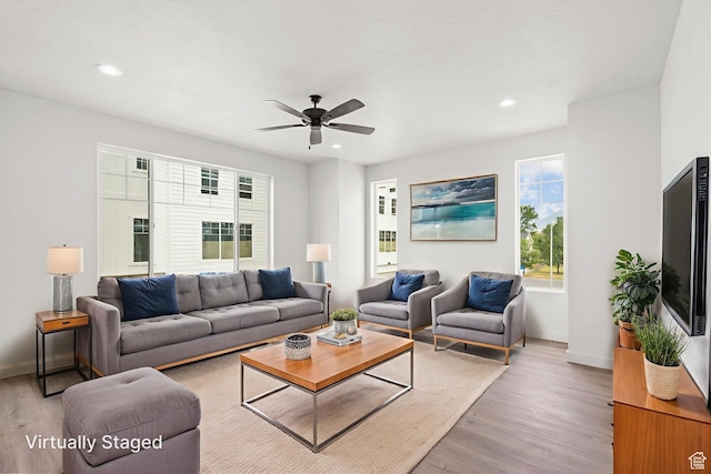688 E 500 S Unit 108, Provo, UT 84606 - living room with light wood-type flooring, a ceiling fan, and recessed lighting
