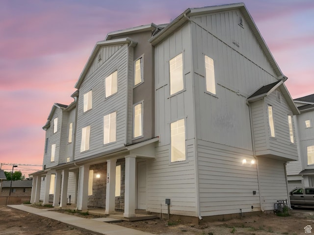 688 E 500 S Unit 108, Provo, UT 84606 - view of front of house featuring covered porch and board and batten siding
