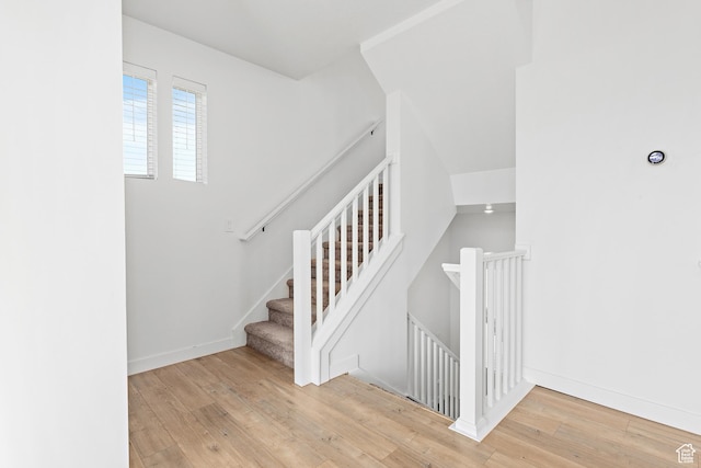 4397 W Bromwell Ct, Lehi, UT 84043 - staircase featuring wood finished floors and baseboards