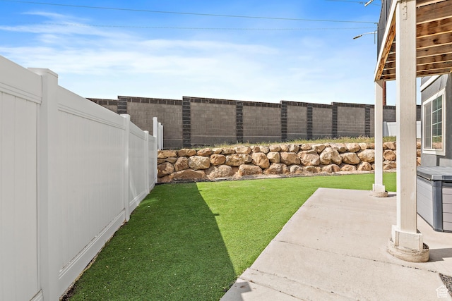 4397 W Bromwell Ct, Lehi, UT 84043 - fenced backyard with a patio area