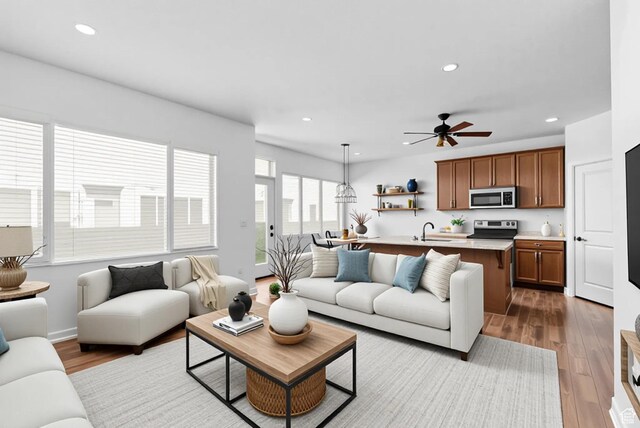 15218 S Tack Way, Bluffdale, UT 84065 - living room with wood finished floors, recessed lighting, and ceiling fan