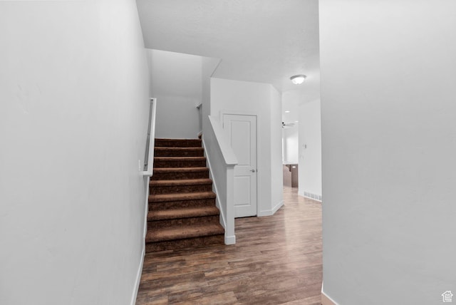 15218 S Tack Way, Bluffdale, UT 84065 - staircase with wood finished floors and baseboards