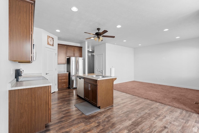 15218 S Tack Way, Bluffdale, UT 84065 - kitchen featuring stainless steel appliances, recessed lighting, ceiling fan, open floor plan, and light countertops