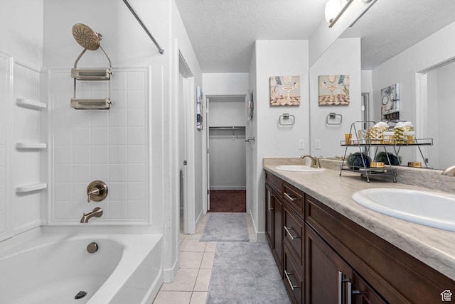 15218 S Tack Way, Bluffdale, UT 84065 - full bath with double vanity, tile patterned floors, shower / bathtub combination, and a textured ceiling