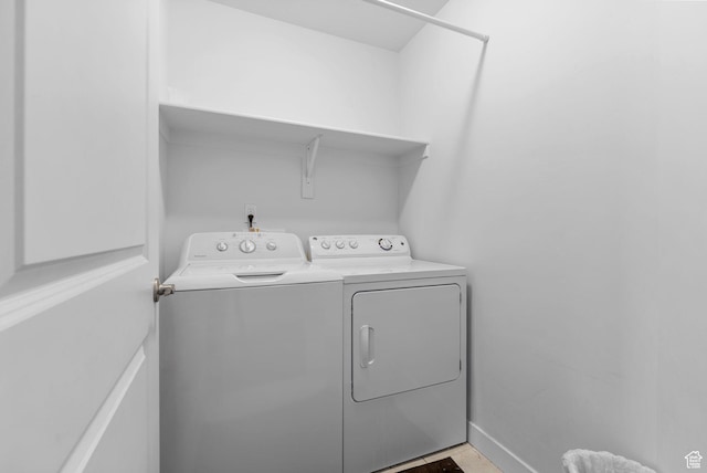 15218 S Tack Way, Bluffdale, UT 84065 - washroom with washer and dryer and baseboards