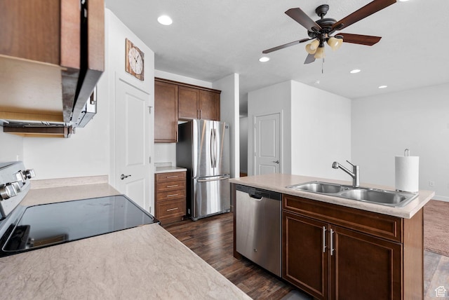 15218 S Tack Way, Bluffdale, UT 84065 - kitchen with appliances with stainless steel finishes, dark wood-style flooring, a ceiling fan, a kitchen island with sink, and recessed lighting