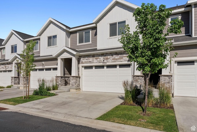 15218 S Tack Way, Bluffdale, UT 84065 - view of front of property with stone siding, a garage, and board and batten siding