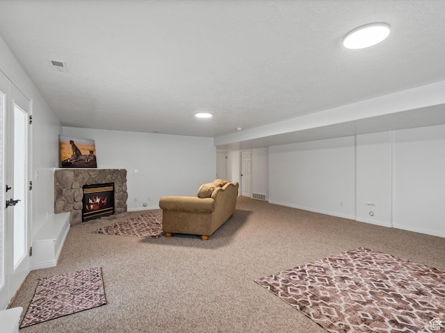 4829 E Patio Springs Cir N, Eden, UT 84310 - living area featuring carpet flooring and a stone fireplace