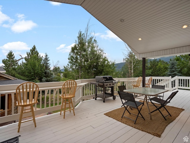 4829 E Patio Springs Cir N, Eden, UT 84310 - deck featuring a grill and outdoor dining area