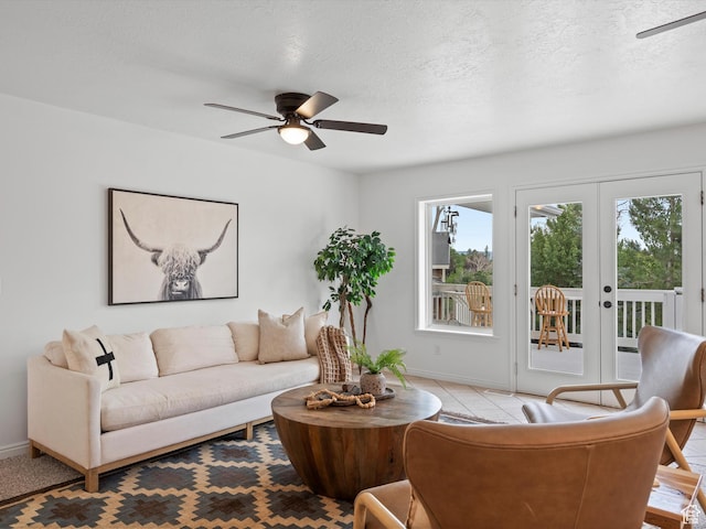 4829 E Patio Springs Cir N, Eden, UT 84310 - living room with a ceiling fan, healthy amount of natural light, french doors, and a textured ceiling
