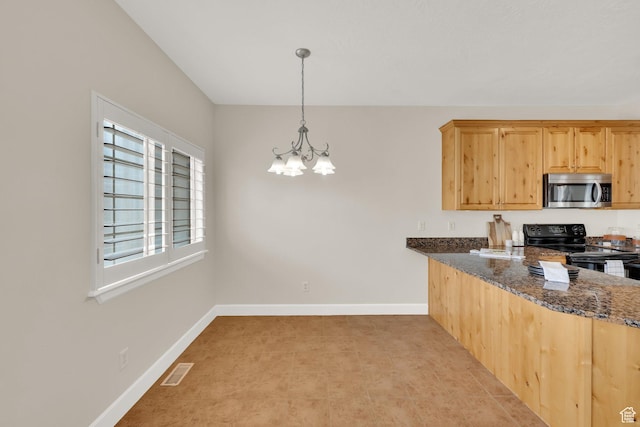 602 E Wyngate Pointe Ln S, Draper, UT 84020 - kitchen with stainless steel microwave, black electric range oven, a chandelier, dark stone countertops, and pendant lighting