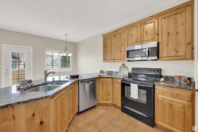 602 E Wyngate Pointe Ln S, Draper, UT 84020 - kitchen with stainless steel appliances, light brown cabinetry, light tile patterned flooring, a peninsula, and dark stone countertops
