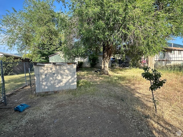 249 N Broadway St E, Tooele, UT 84074 - view of yard with a shed