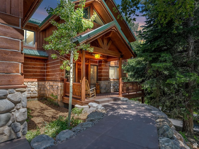 8998 Timphaven Rd, Sundance, UT 84604 - doorway to property with a porch and stone siding