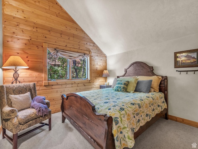 8998 Timphaven Rd, Sundance, UT 84604 - bedroom featuring wood walls, light colored carpet, and vaulted ceiling