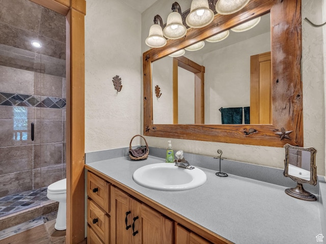8998 Timphaven Rd, Sundance, UT 84604 - bathroom featuring vanity, a stall shower, and a textured wall
