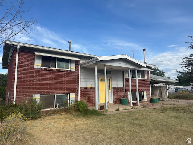4220 S 2075 W, Roy, UT 84067 - view of front of house with brick siding and a front yard