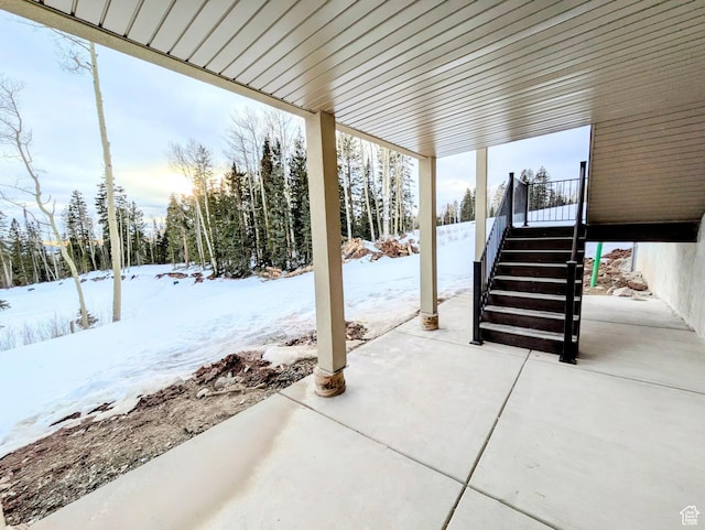 251 N Summit Dr, Beaver, UT 84713 - snow covered patio featuring a patio area and stairs