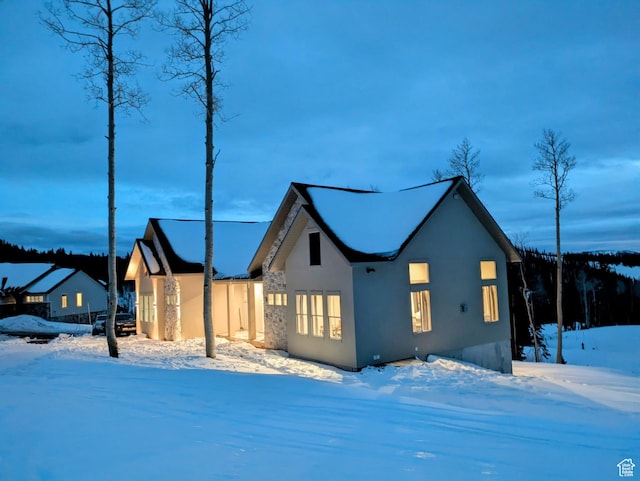 251 N Summit Dr, Beaver, UT 84713 - snow covered property featuring stucco siding