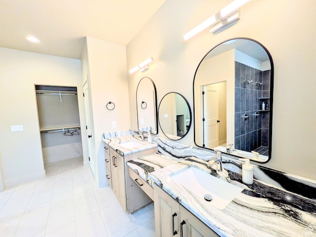 251 N Summit Dr, Beaver, UT 84713 - full bath featuring double vanity, tile patterned floors, tiled shower, and a walk in closet