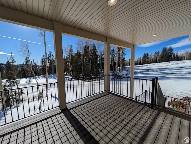 251 N Summit Dr, Beaver, UT 84713 - snow covered deck featuring view of scattered trees