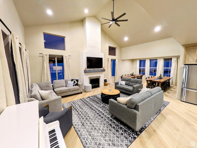 251 N Summit Dr, Beaver, UT 84713 - living room featuring high vaulted ceiling, light wood finished floors, ceiling fan, recessed lighting, and a fireplace